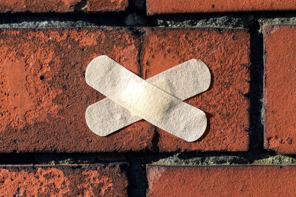 crumbling brick on a chimney is a needed repair Crumbling brick chimney